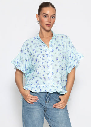 Musselin Bluse mit Rüschensaum und Blumenprint - blau