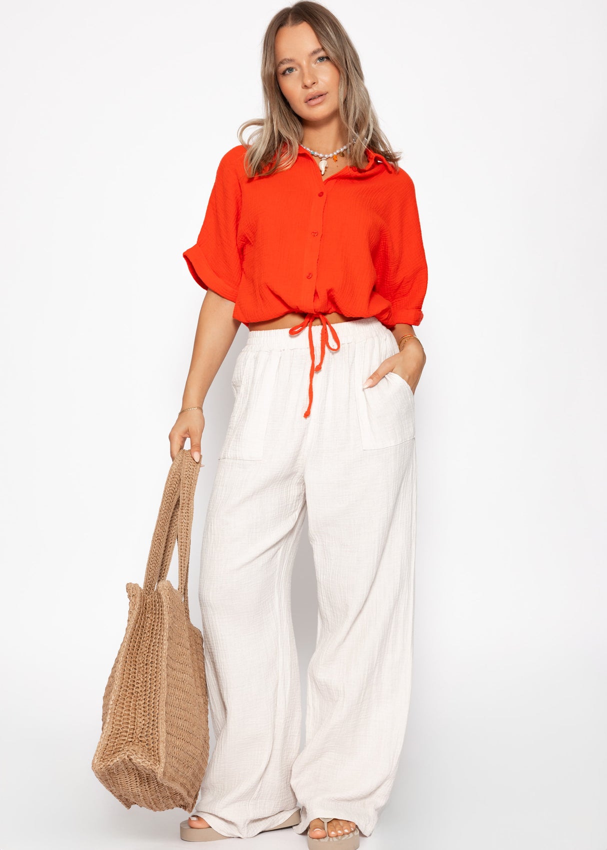 Musselin blouse with a train band - orange