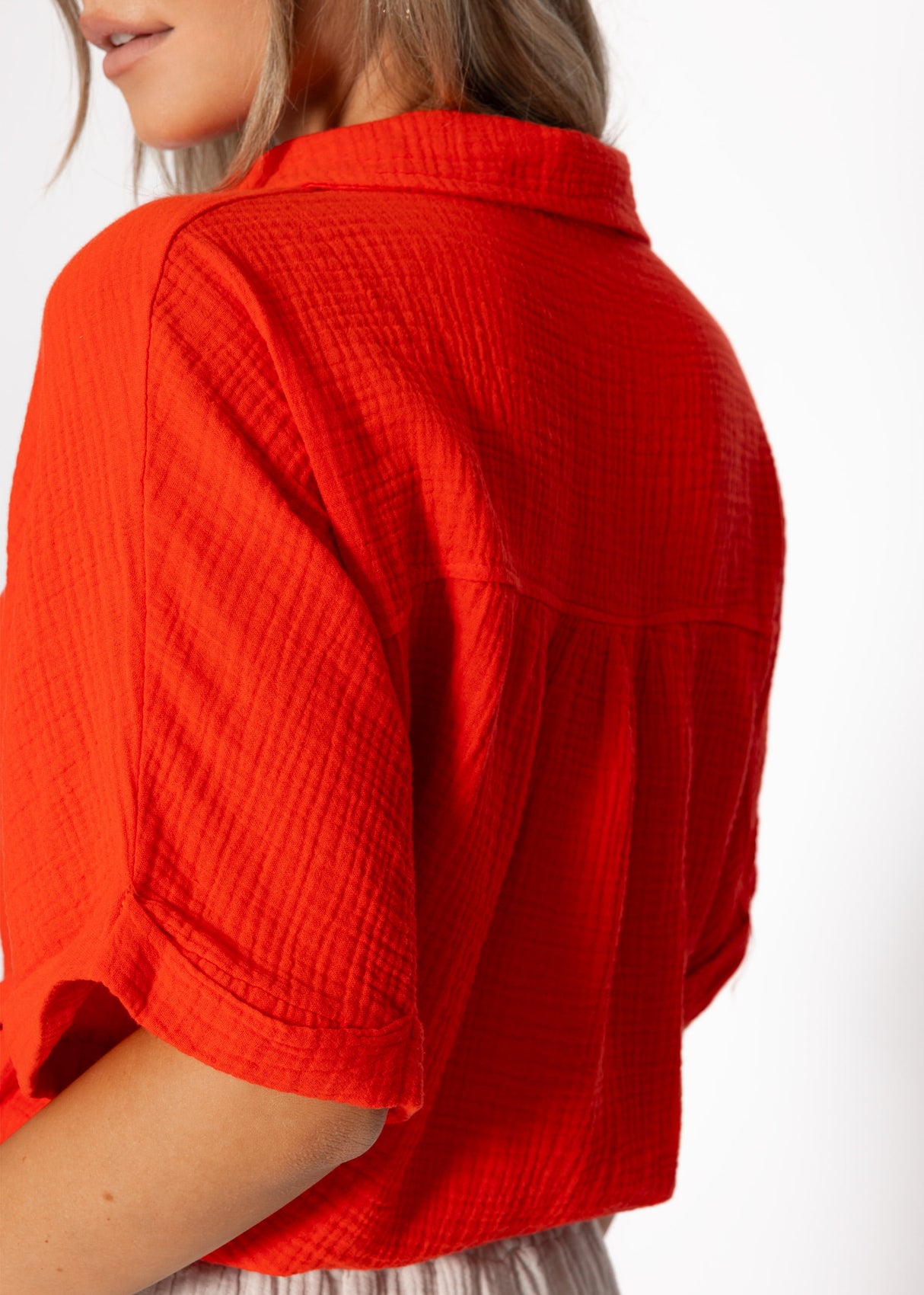 Musselin blouse with a train band - orange