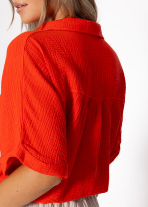 Musselin blouse with a train band - orange