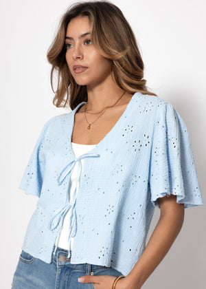 Muslin blouse with tie fastening and eyelet embroidery - light blue