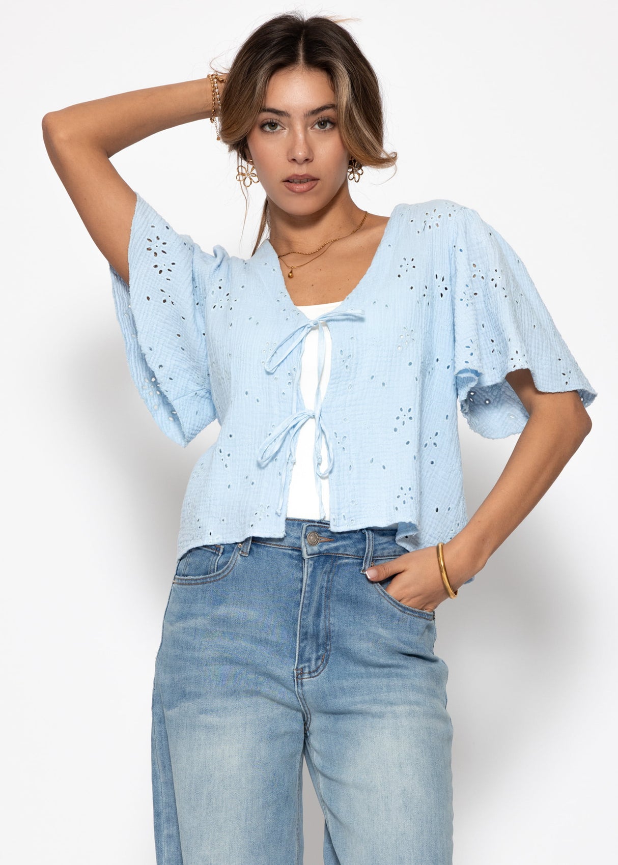Muslin blouse with tie fastening and eyelet embroidery - light blue