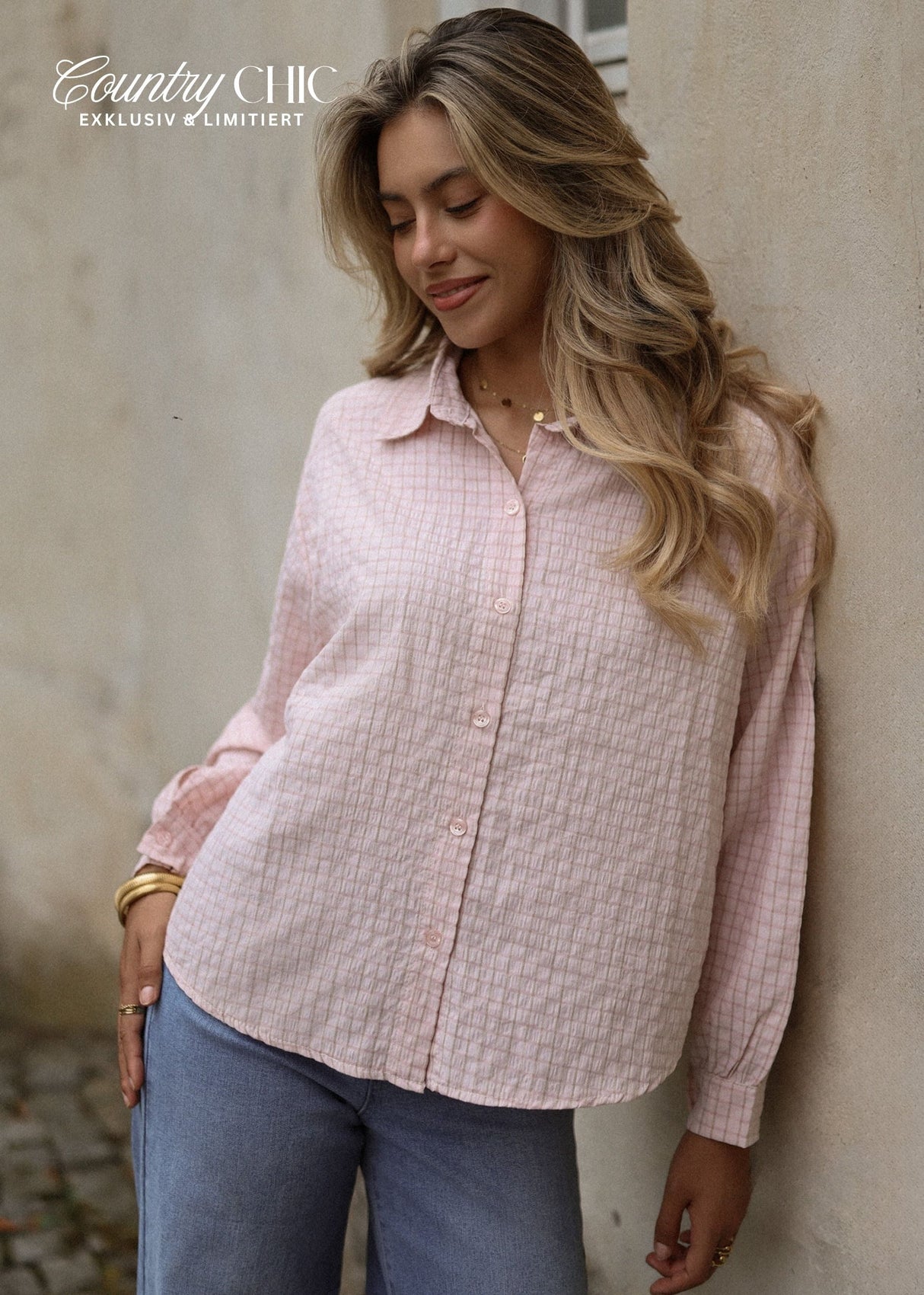 Oversized blouse with a check pattern - pink