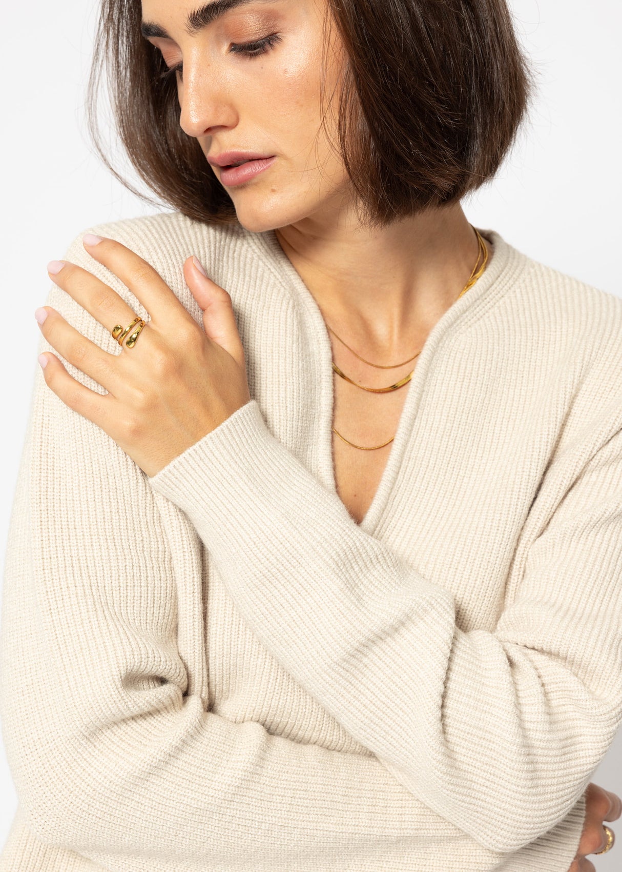 Sweater with accentuated V-neck - beige