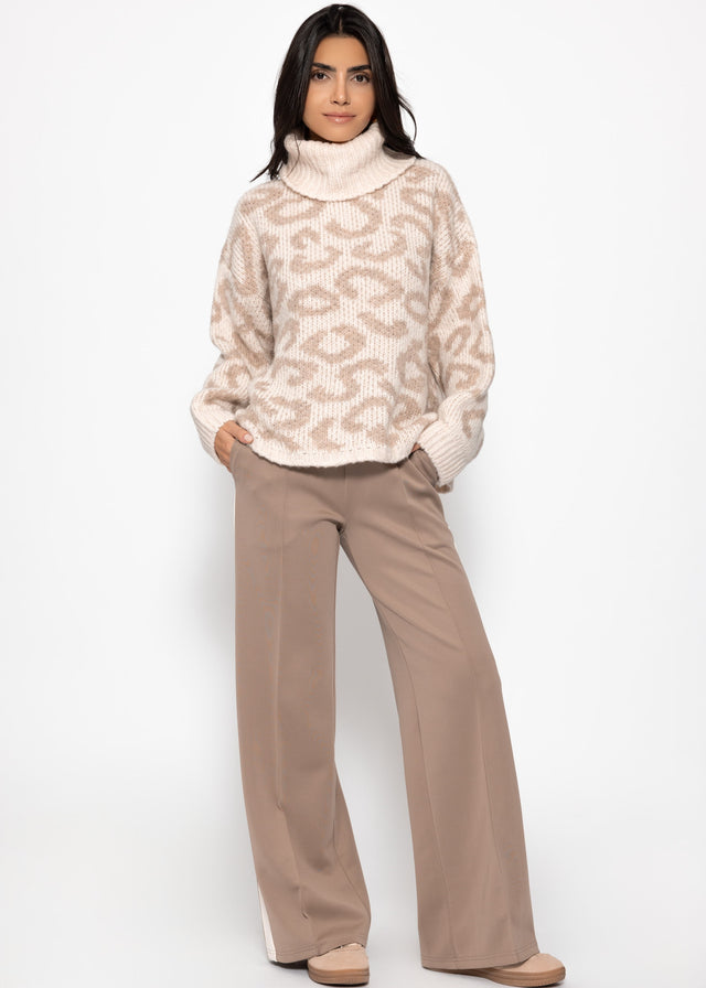 Rollkragenpullover mit Leomuster - beige