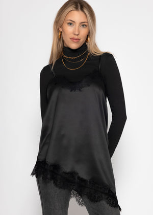 Satin-Top mit Spitze und asymmetrischem Saum - schwarz