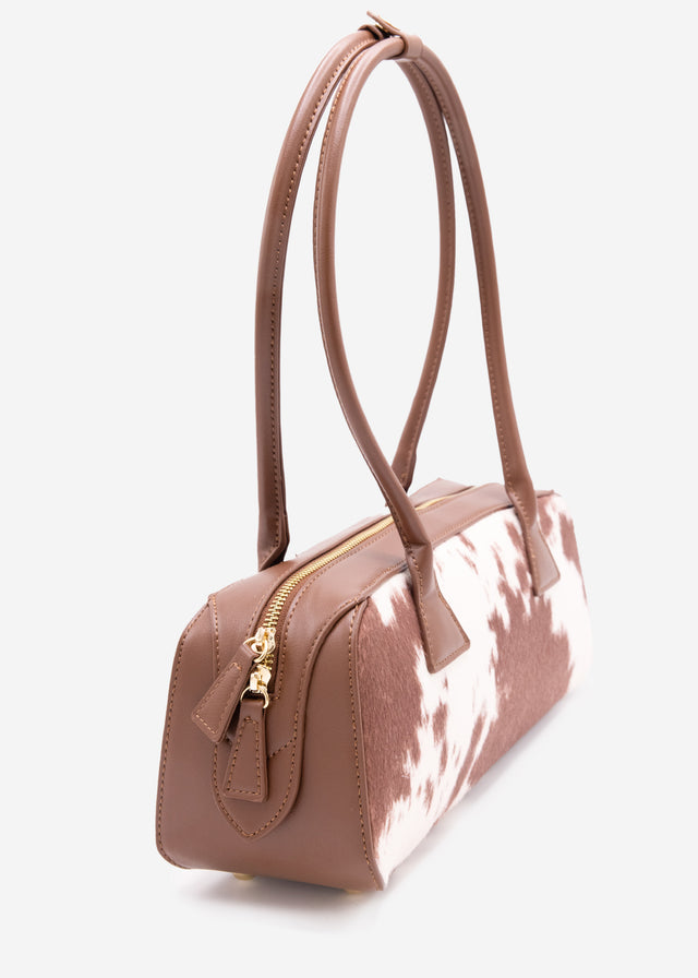 Faux leather shoulder bag with cow print - brown