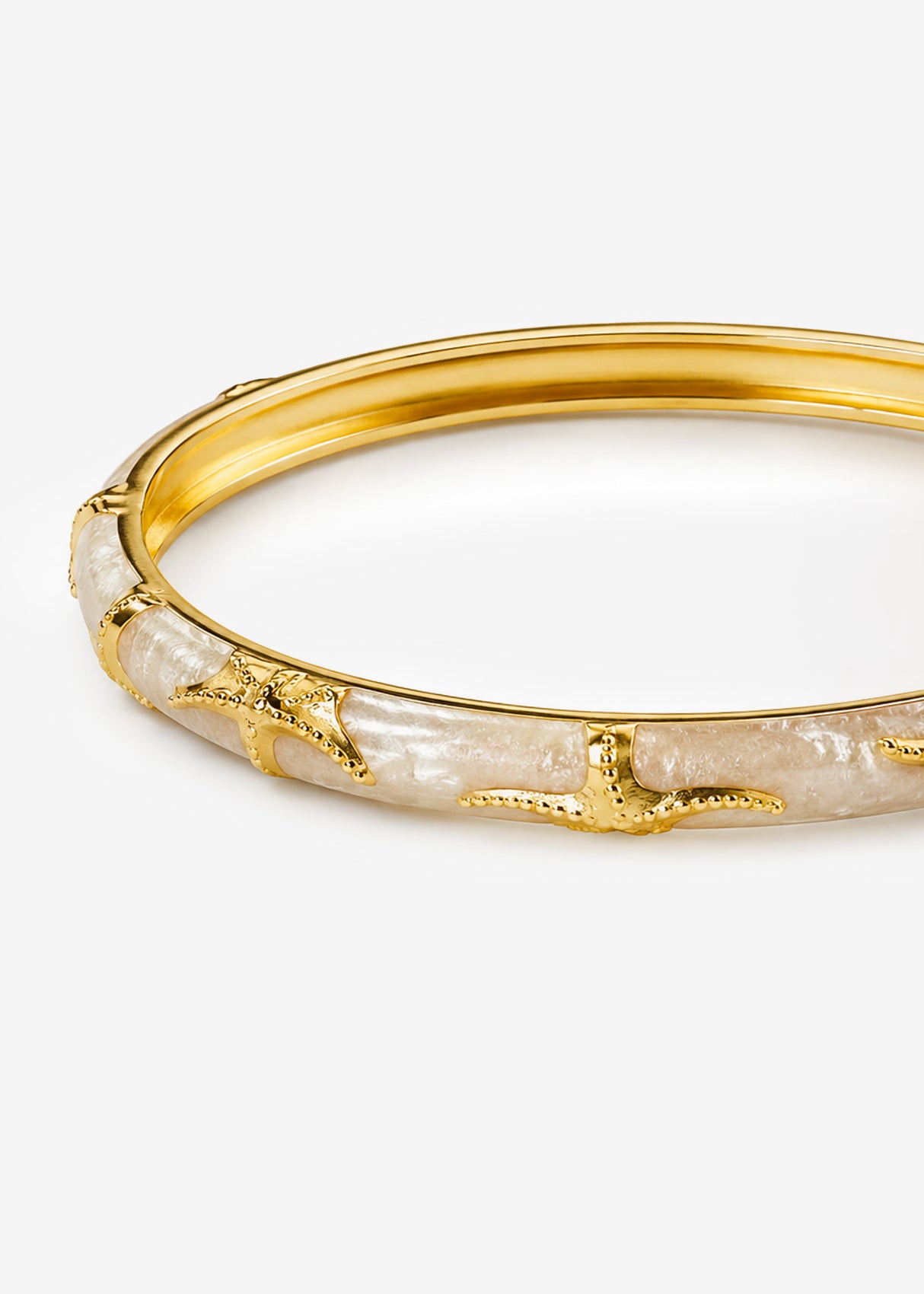 Armreif Seestern mit Perlmutt Optik - gold-weiß