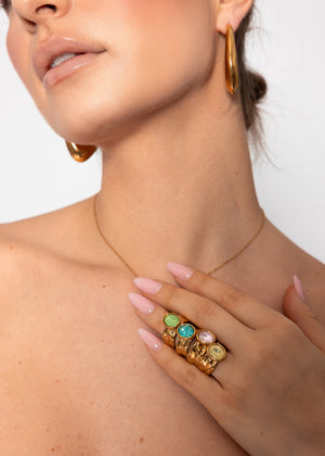 Statement ring with green gemstone - gold