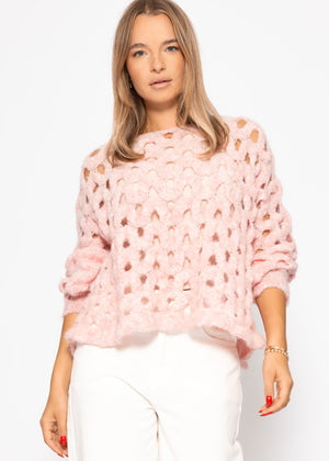 Knitting sweater with hole pattern - pink