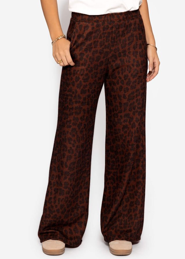 Wide trousers with Leo print - brown