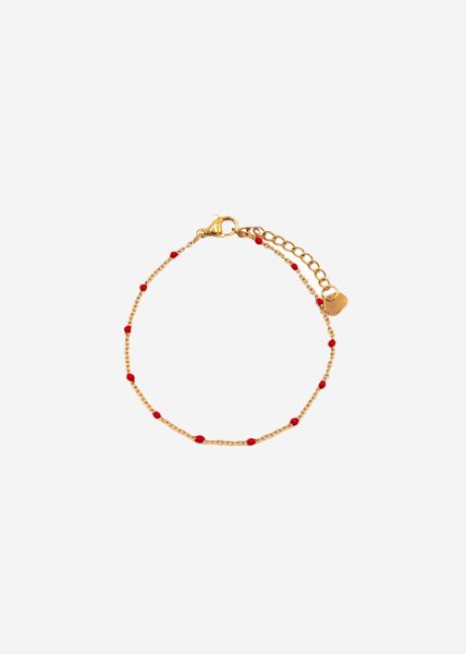 Armband mit roten Perlen - gold