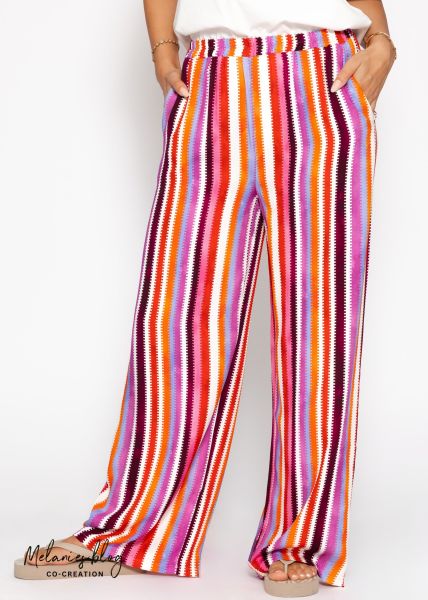 Gemusterte Hose mit weitem Bein - pink