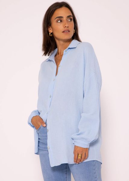 Musselin Bluse mit abgerundetem Saum, hellblau