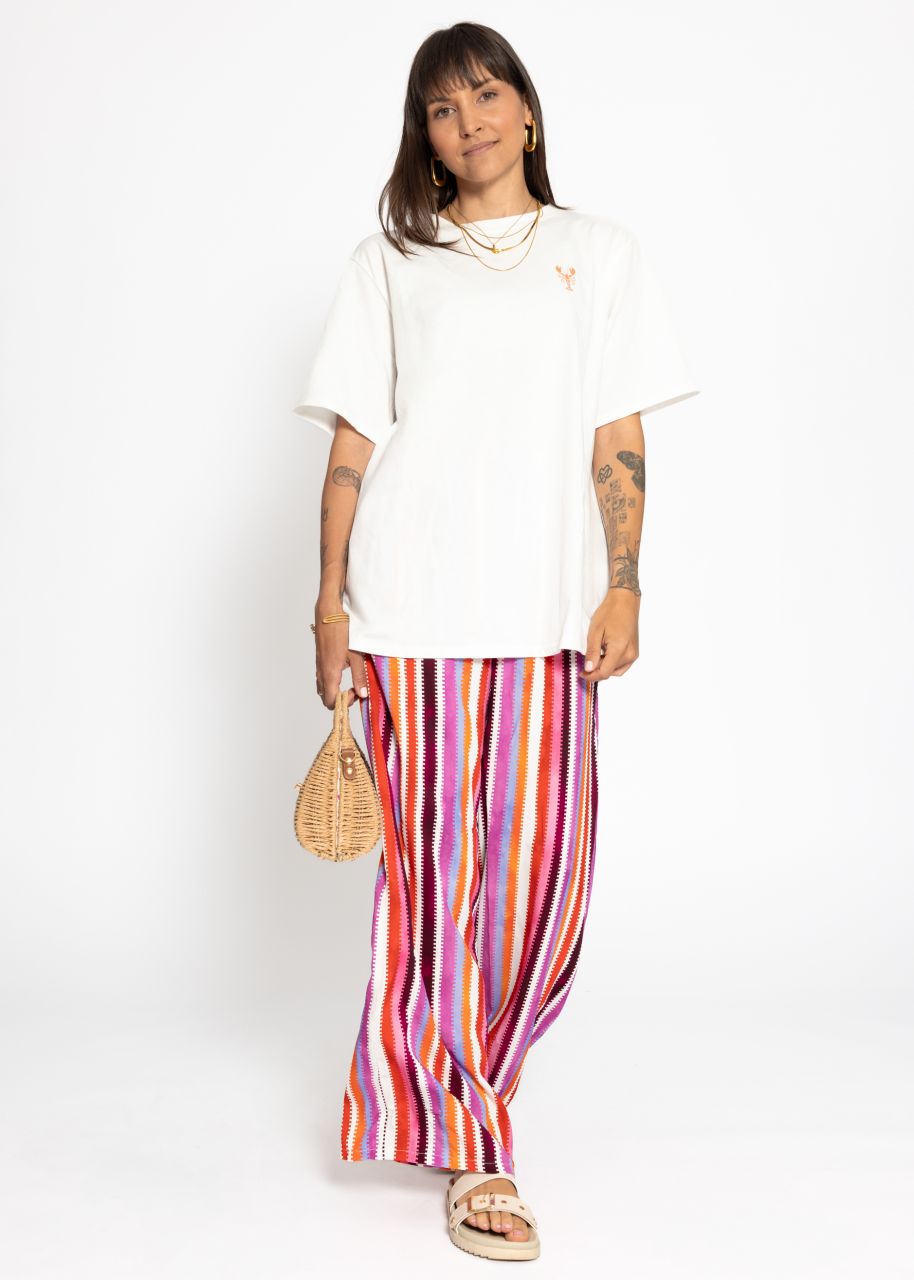 Gemusterte Hose mit weitem Bein - pink