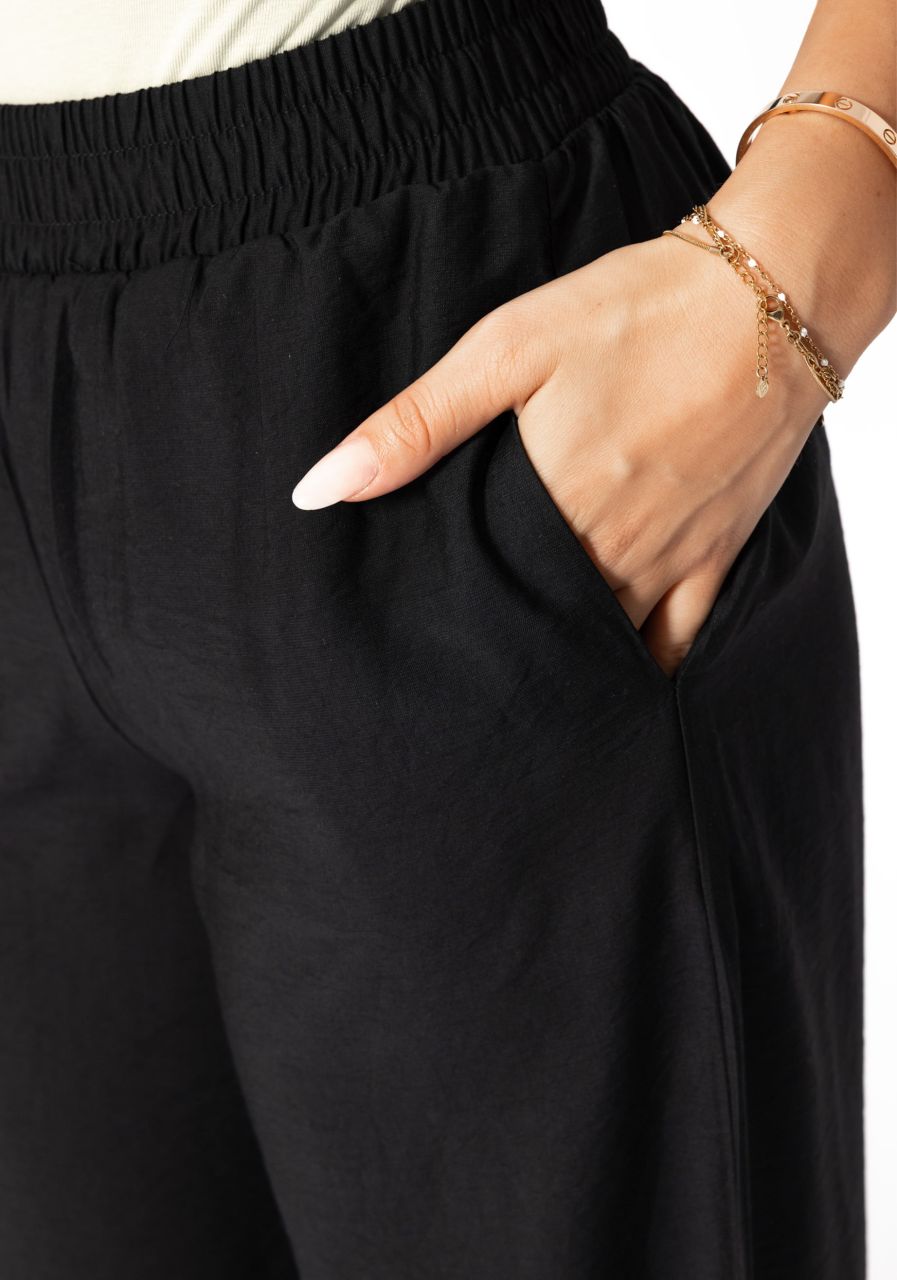 Glänzende Stoffhose mit geradem Bein - schwarz