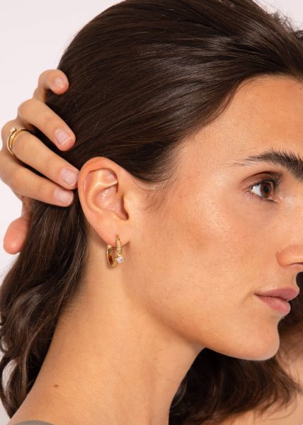 Ohrringe mit funkelndem Steinchen, gold
