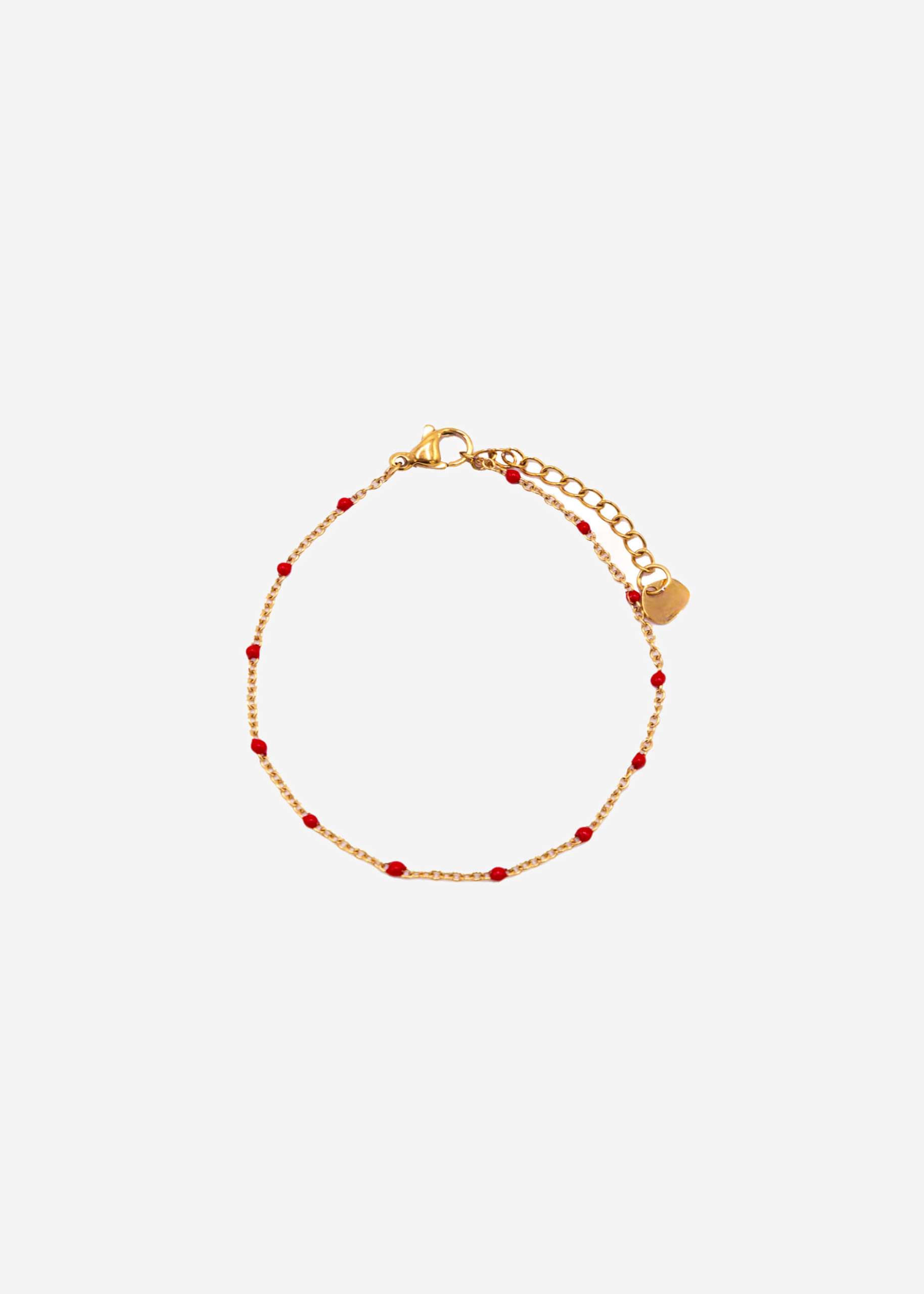Armband mit roten Perlen - gold