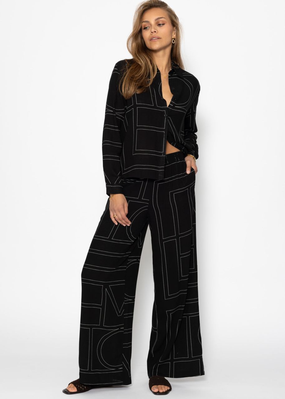 Schlupfhose mit Print - schwarz