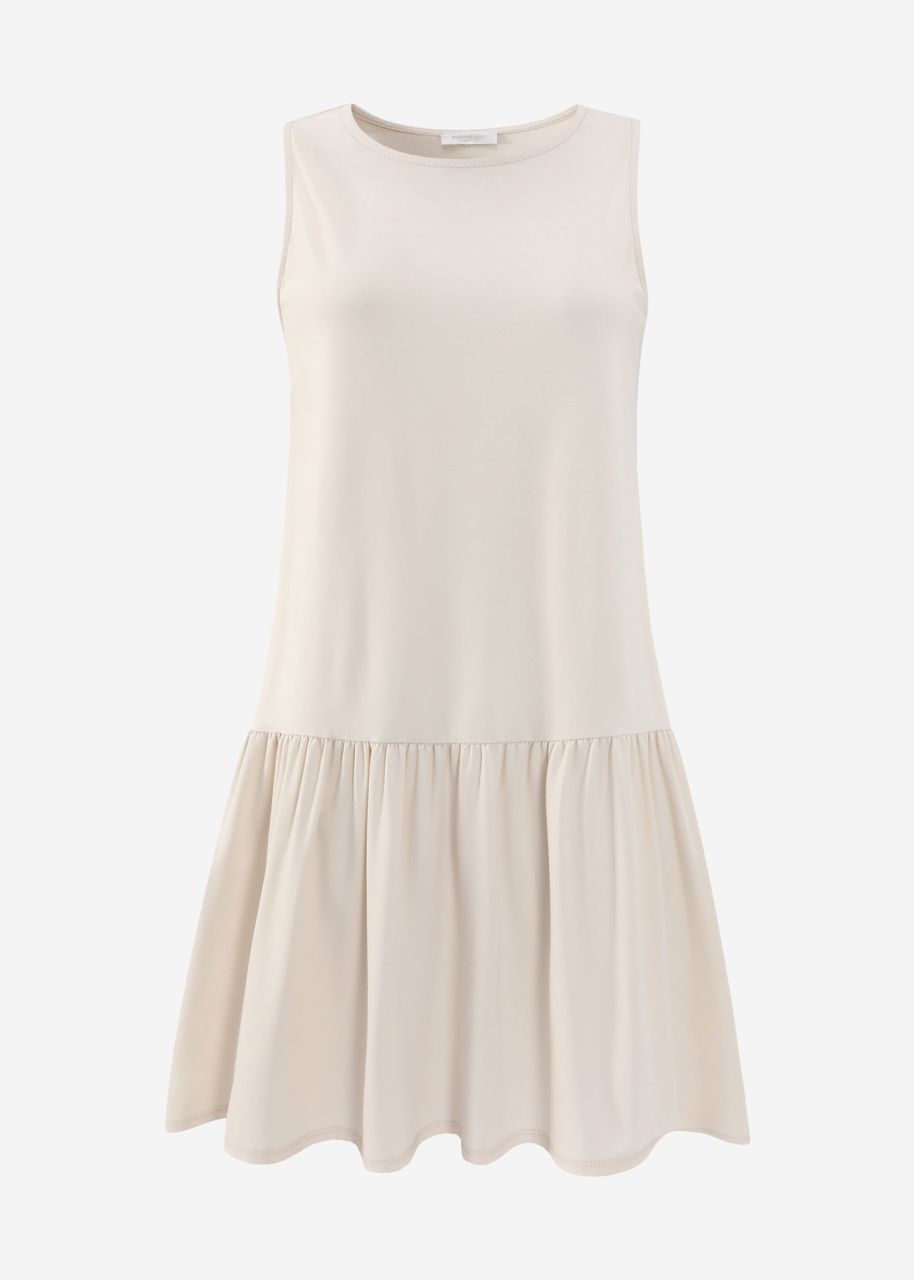 Ärmelloses Kleid mit Volant - beige