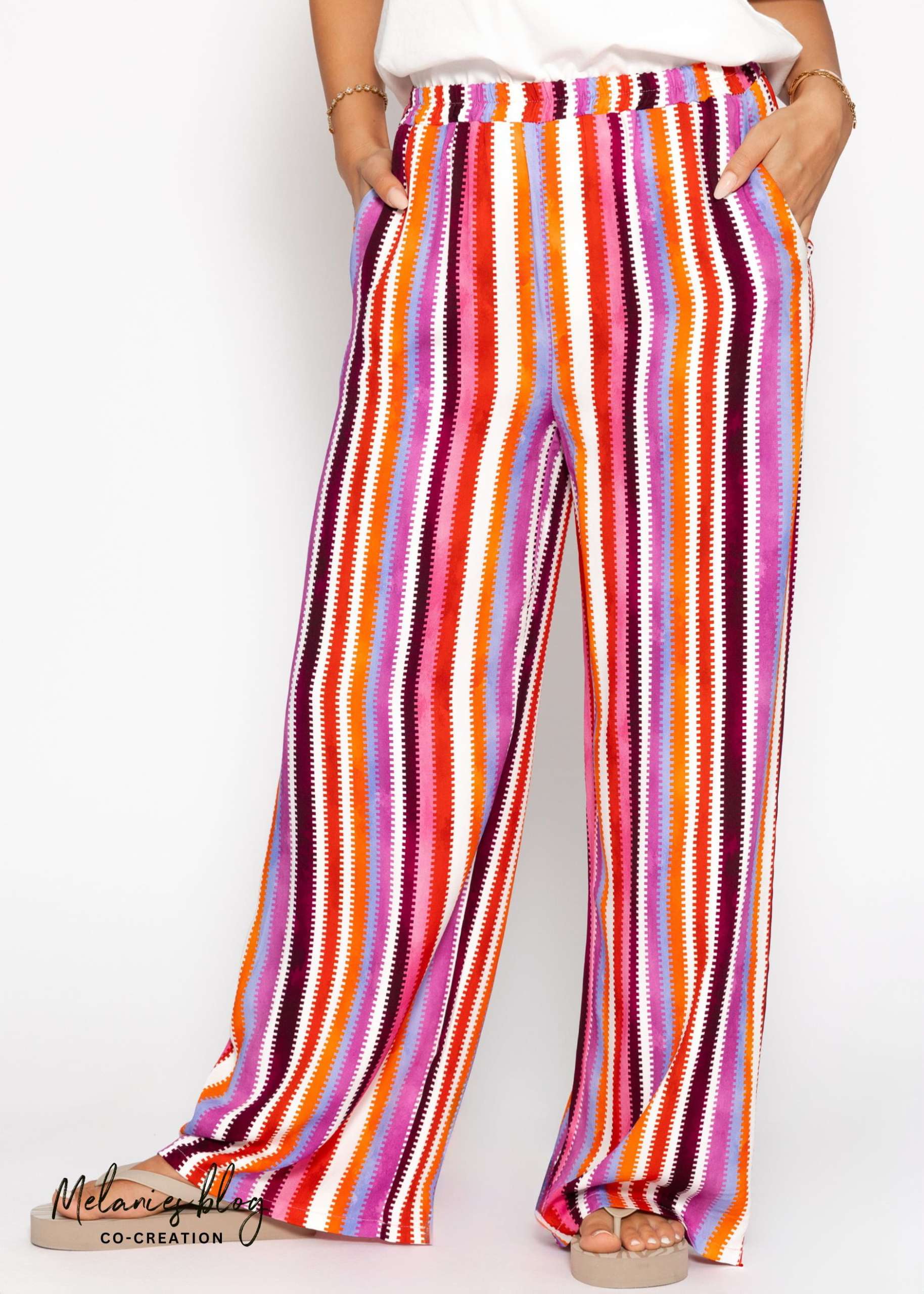 Gemusterte Hose mit weitem Bein - pink